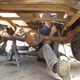 Fellow Lemons racer Bob Harnsberger installing a roll cage in a truck involves crawling around the bed.
